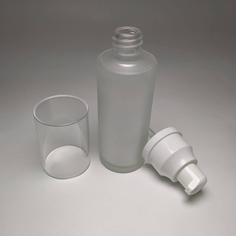 Simple design cylinder 50ml matte glass bottle white plastic cream/lotion pump 18/415 neck size