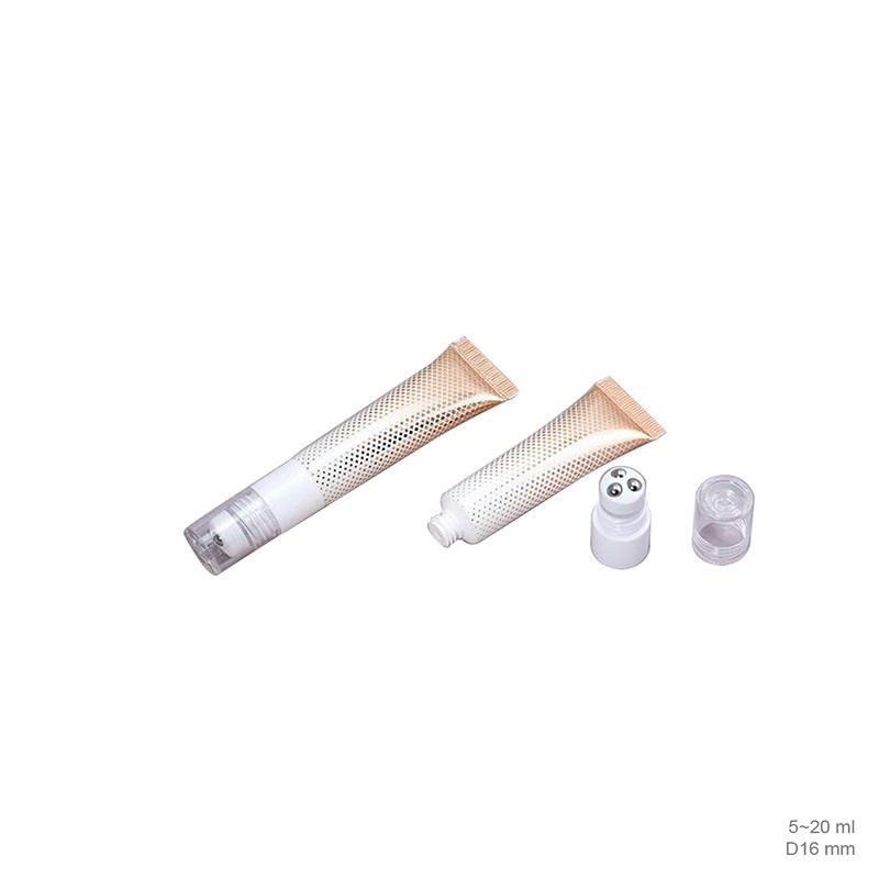 Facial care tube packaging with stainless steel roller ball massager